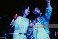 Jackson Browne and Lowell George performing on stage (Photo by Fin Costello/Redferns)